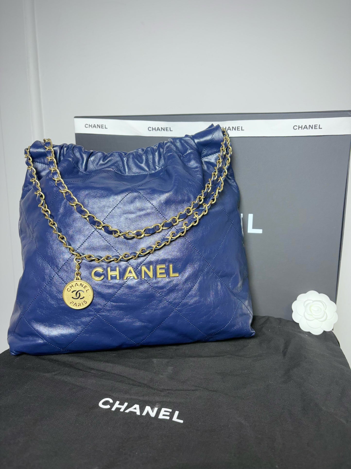Chanel 22 Calfskin Leather Metallic Navy Blue Quilted Purse