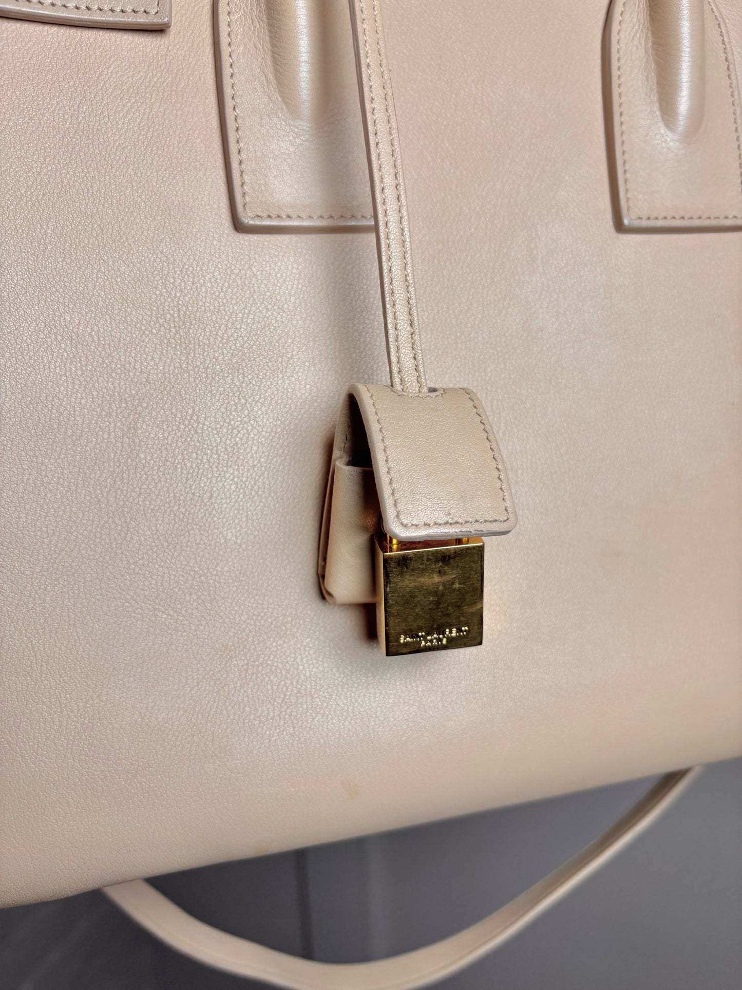 Leather "Sac De Jour" Saint Laurent Solid Cream Calfskin Medium Purse