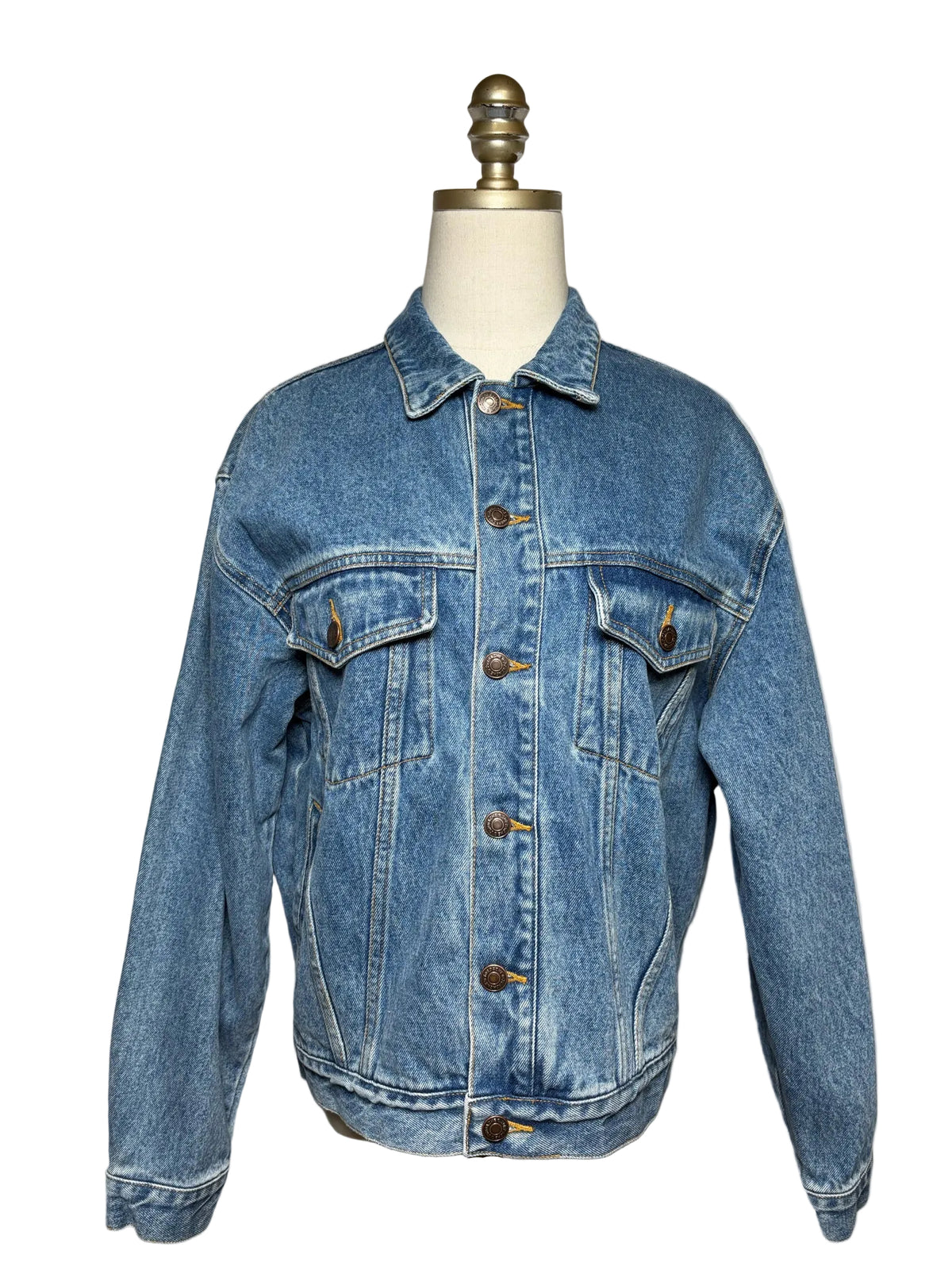Blue denim jean jacket on a mannequin