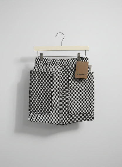 Women Size 4 Burberry Black, White Mesh and Neoprene Mini NWT Skirt