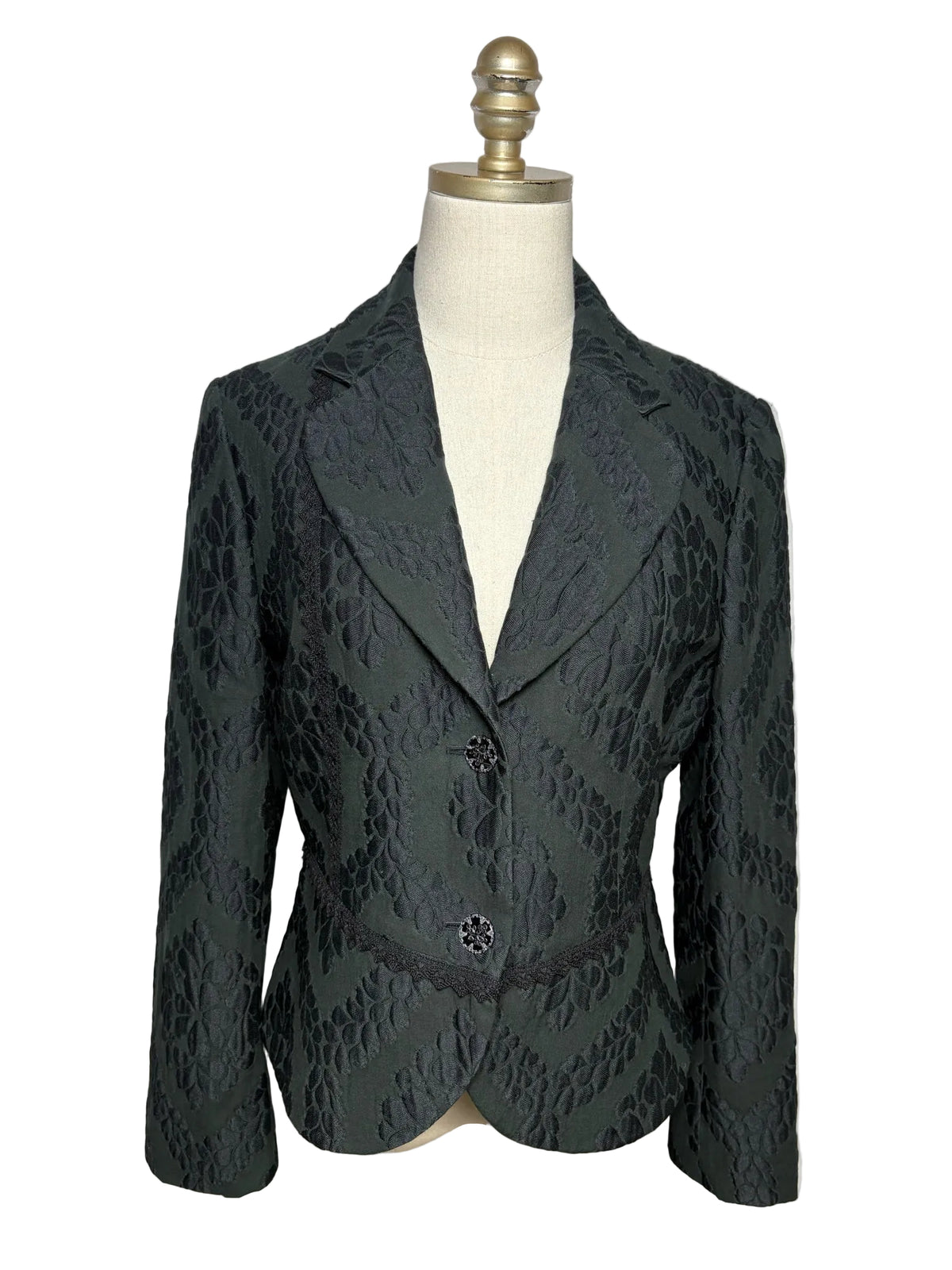Black Jacquard jacket with two sparkle buttons and a lace trim around the waist