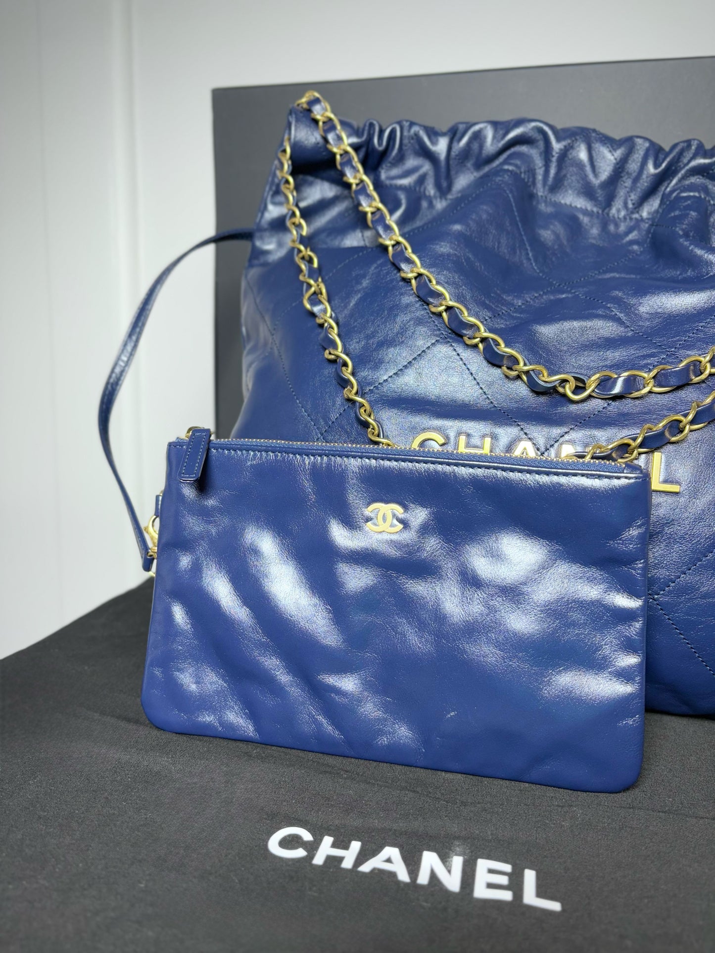 Chanel 22 Calfskin Leather Metallic Navy Blue Quilted Purse