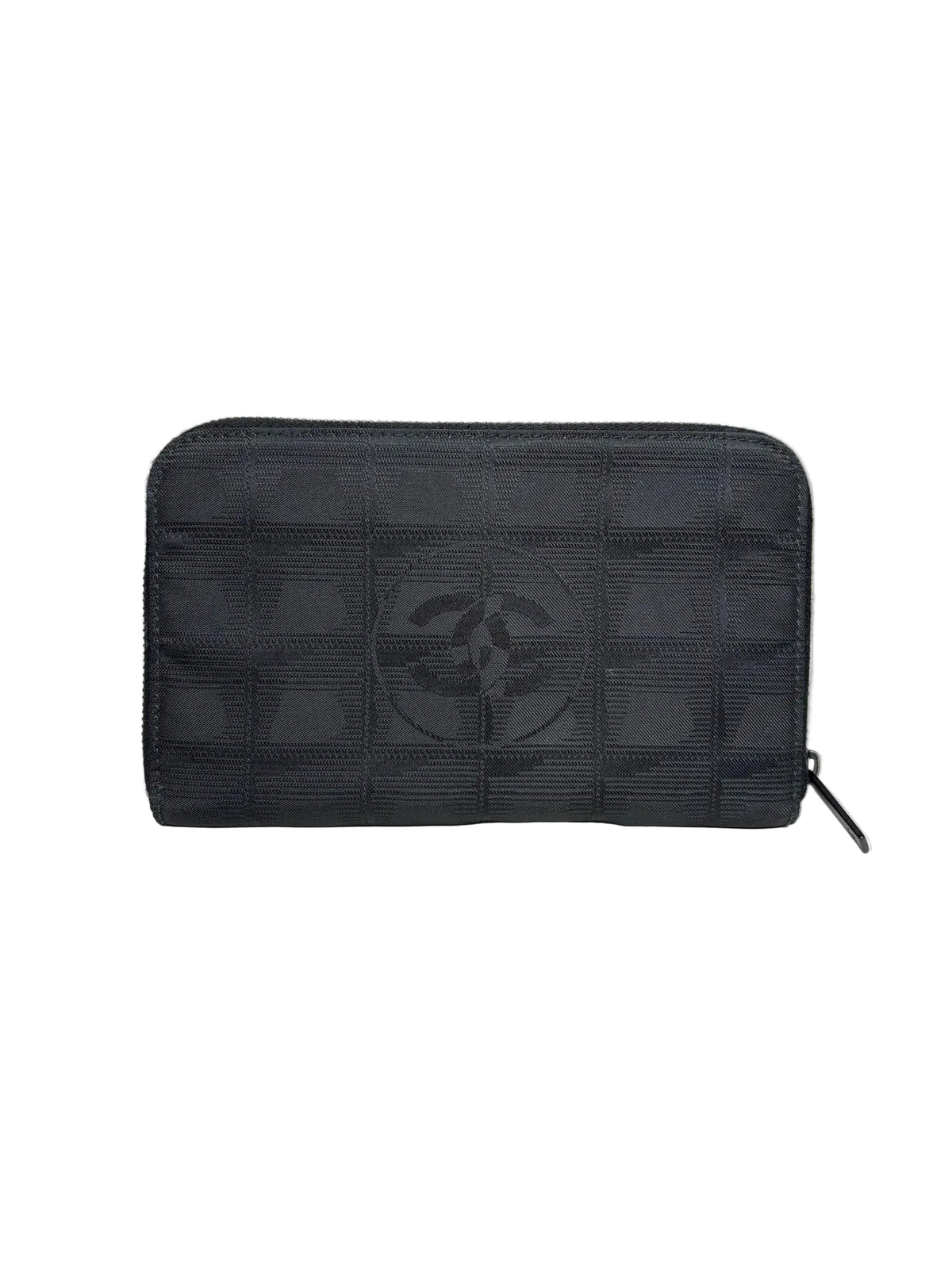 Black nylon Chanel wallet with a Chanel logo in the middle