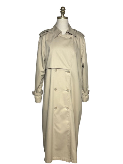 Tan trench coat with eight buttons on a mannequin in front of a white background