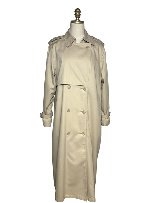Tan trench coat with eight buttons on a mannequin in front of a white background