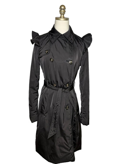 Black long jacket with a belt on a mannequin.
