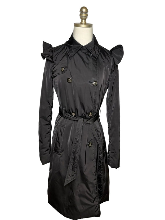 Black long jacket with a belt on a mannequin.
