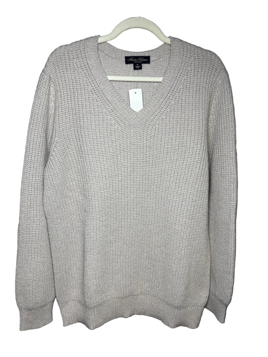 Cream Brooks Brothers sweater on a hanger