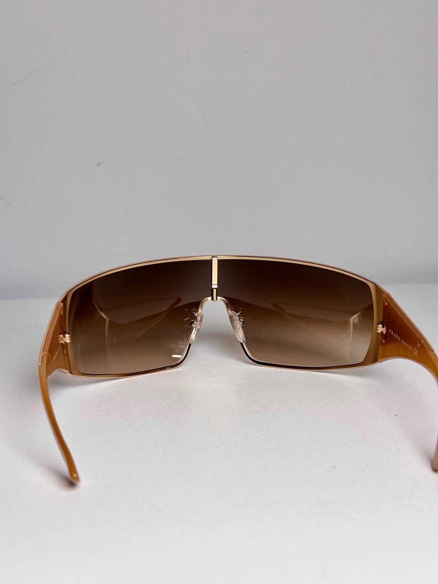 Prada Pre-owned Gold Shield SPR 57H Eyewear