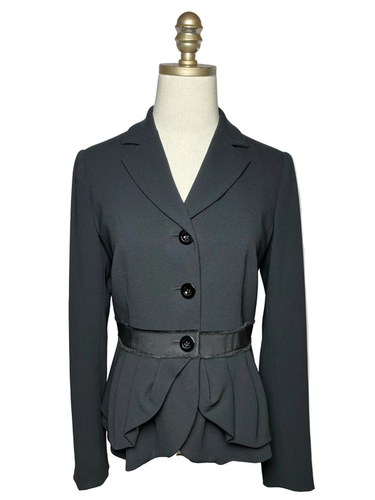 Black blazer on a mannequin.