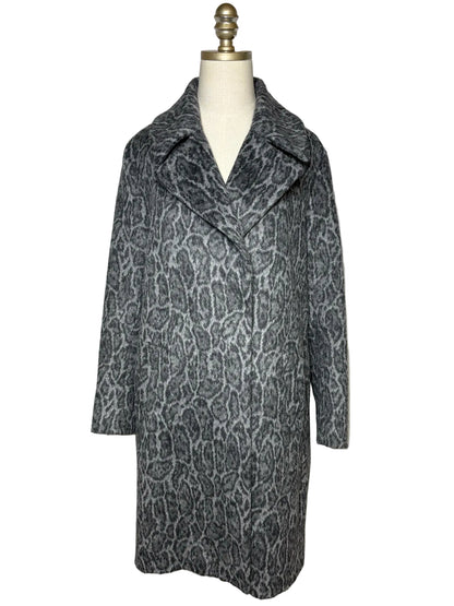 Grey animal print jacket on a mannqeuin.