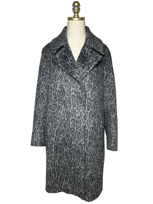 Grey animal print jacket on a mannqeuin.