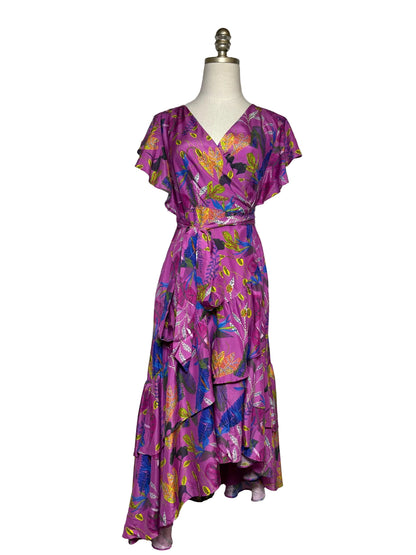 Purple floral pattern dress on mannequin with a white background