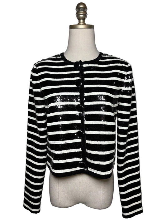 Mannequin wearing black and white stripe sequin jacket