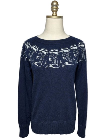 Blue Chanel sweater with design of a womans profile in white