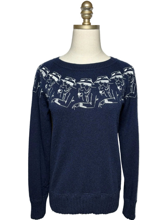 Blue Chanel sweater with design of a womans profile in white