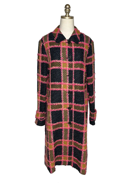 Pink, yellow, and blue checkered coat on a mannequin.