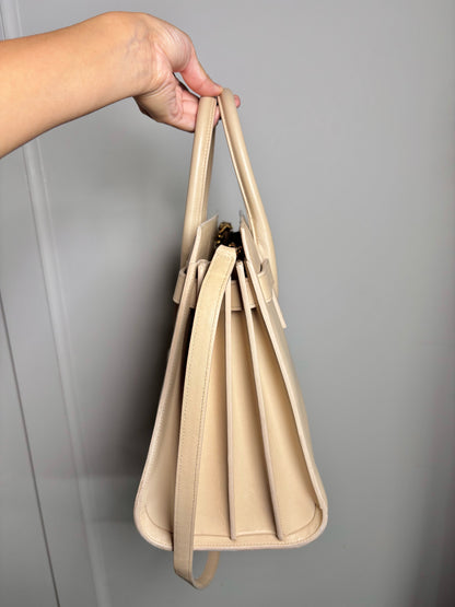Leather "Sac De Jour" Saint Laurent Solid Cream Calfskin Medium Purse