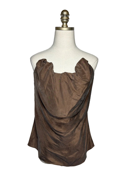 Mannequin wearing brown flowy strapless top