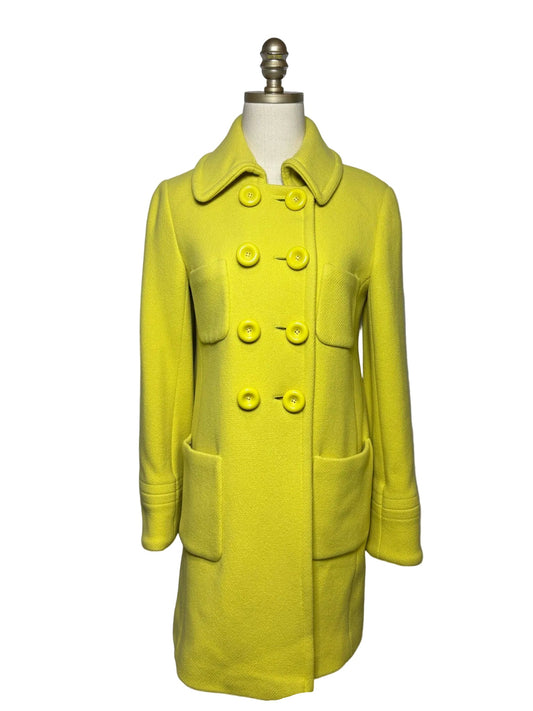 Yellow peacoat jacket on a mannequin