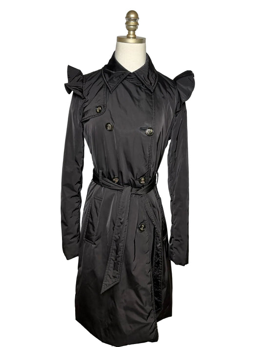 Black long jacket with a belt on a mannequin.