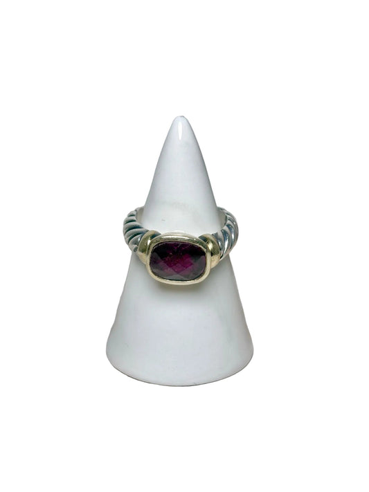 David Yurman two-tone ring with purple gemstone center.