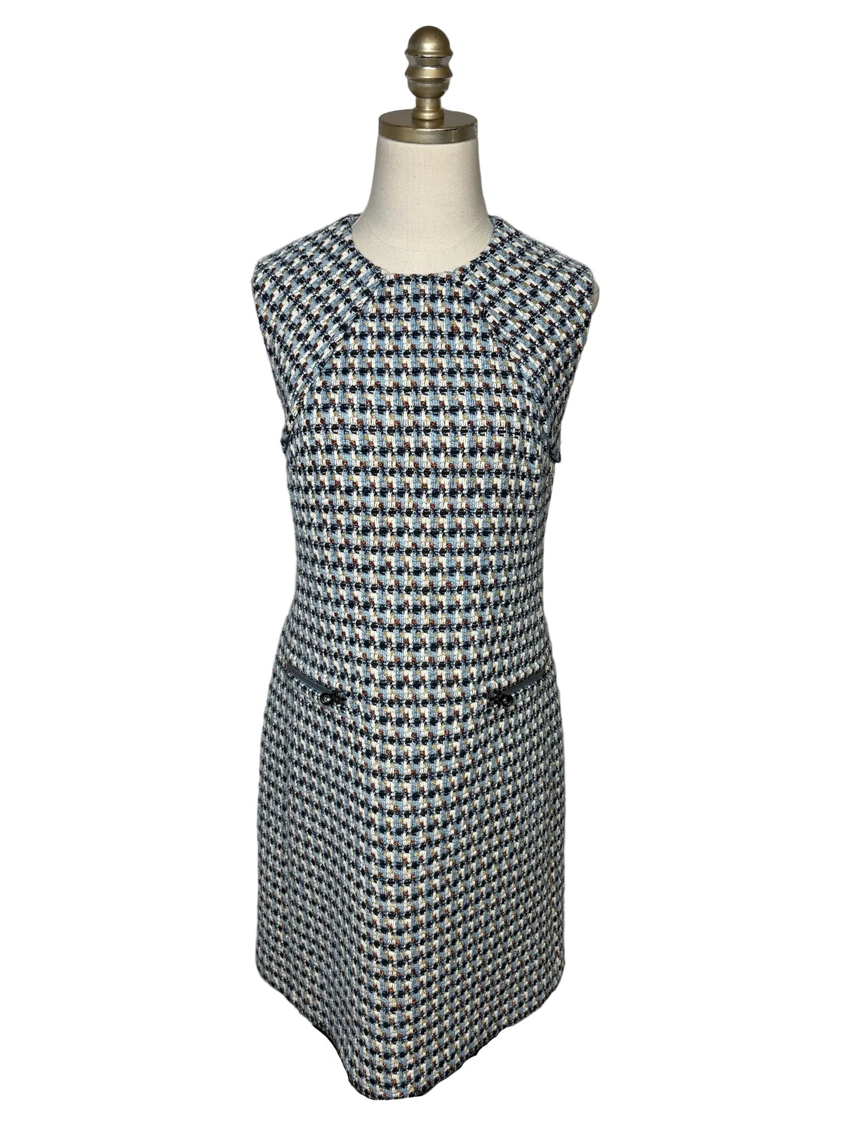 Blue and white St. John dress with two zipper pockets.