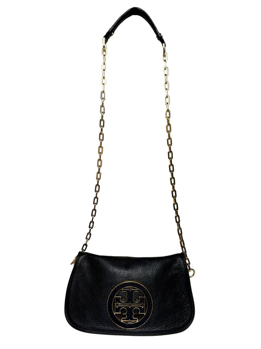 Black Tory Burch Purse with a gold logo and gold chain crossbody strap in front of a white background
